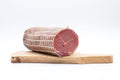 Pezzo di Lombino artigianale di Cirigliano (Sapori Mediterranei) da 500g, colore rosa compatto e magro, selezionato da Borgo Calvera.